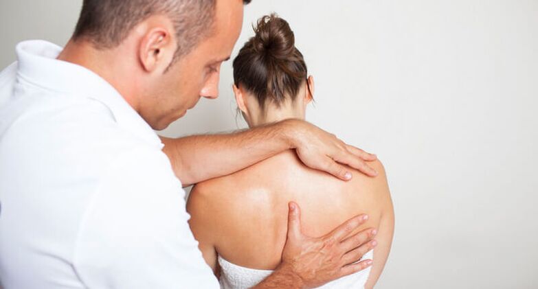 Examination and back massage by a specialist