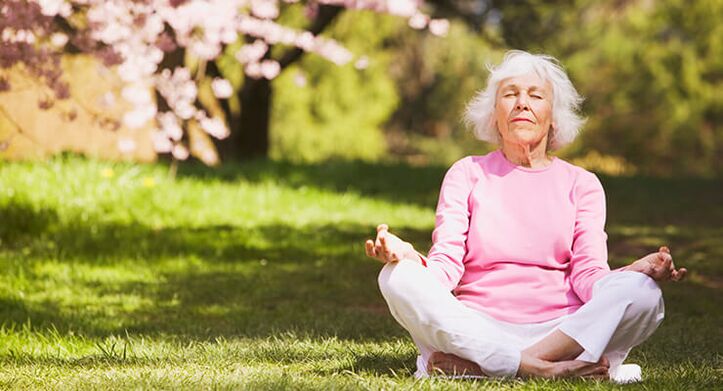 elderly woman meditating with osteoarthritis of the hip